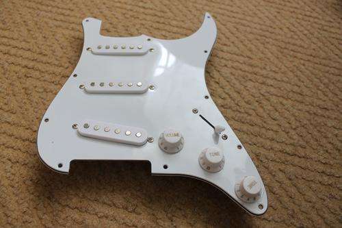 White Stratocaster loaded pickguard for strat shaped guitar