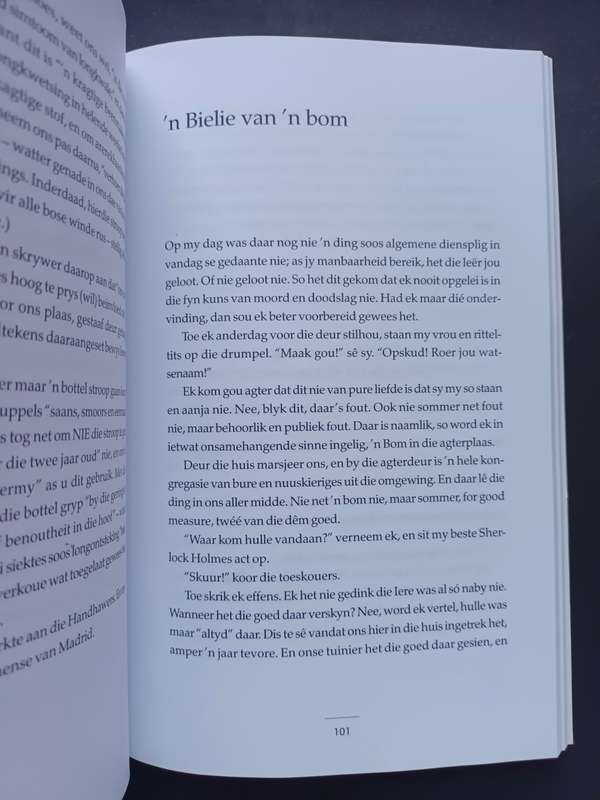Met `n glimlag / Andre P. Brink