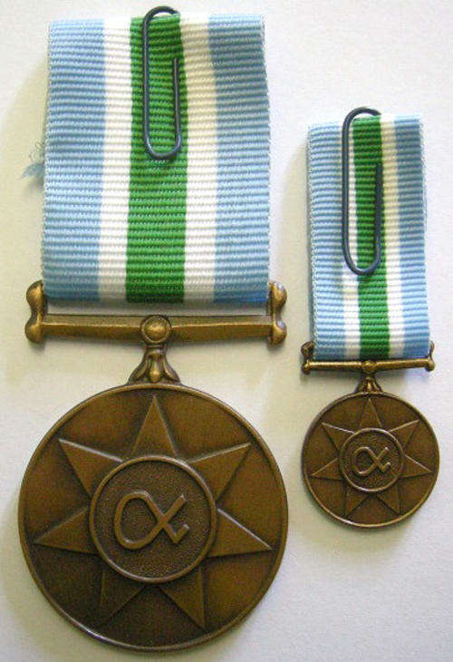 Full Size Unitas Medal Numbered at Back In Orignal Box Numbered w/ Miniature Unitas Medal