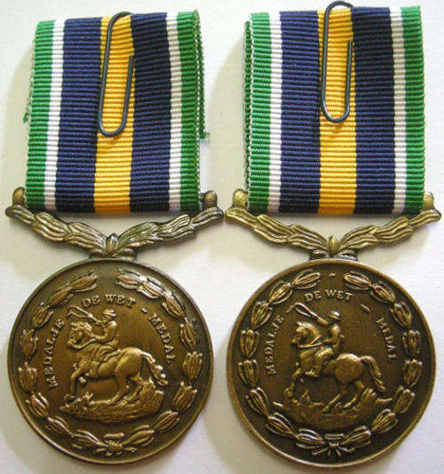 Full Size De Wet Medal x 2 Variations Both Numbered @ Back One Poor Detail & One Crisp Detail