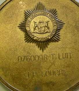 Full Size SA Police Medal Group of Four Named to A/O JP Fouche w/ Ribbon Bar