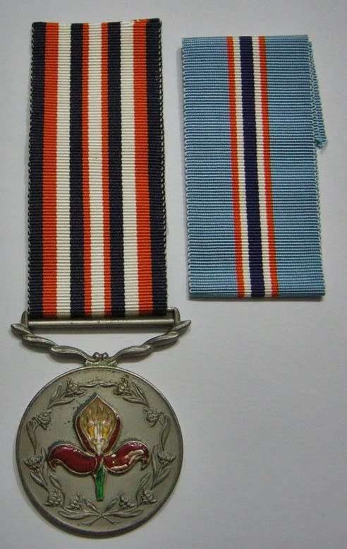 Full Size Pro Merito Medal 1967 Nr 1 on Rim w/ 1967 & 1968 Ribbons (Specific Medal in Matthysen)