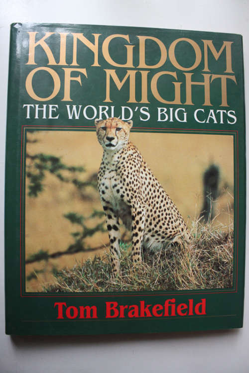 Kingdom of Might: The World`s Big Cats by Tom Brakefield