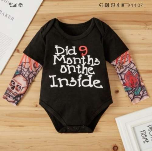 Cute baby vest with tattoo arms