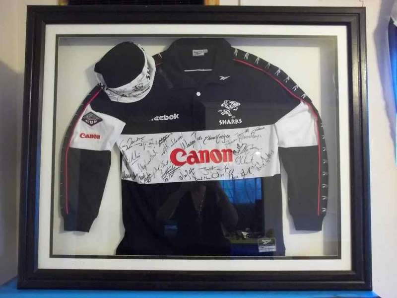 2001/2002 Sharks Rugby Team Autographed Rugby Jersey + Cap In A Quality Frame Behind Glass