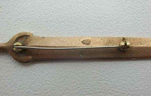 Gilded(?) N M Kopi Sword Brooch/Badge - Length 9,7cm