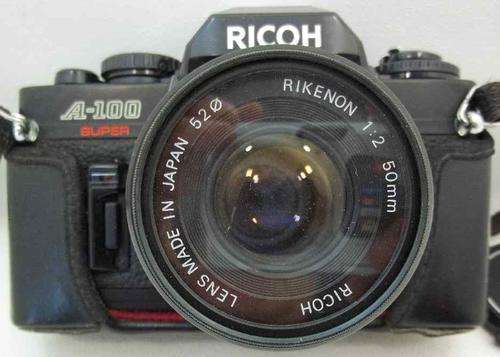 Ricoh A-100 Camera With Ricoh Rikenon 1:2 50mm And Sunny 52mm UV Filter