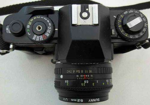 Ricoh A-100 Camera With Ricoh Rikenon 1:2 50mm And Sunny 52mm UV Filter
