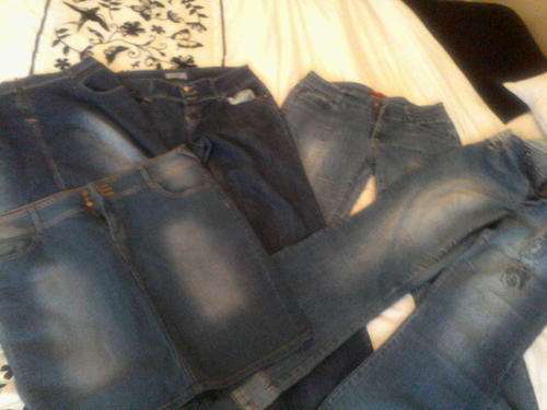 3 Jeans and 2 denim skirts all size 38.
