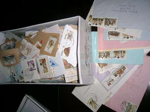 Box containing RSA stamps on paper +  few covers - 100's of stamps!