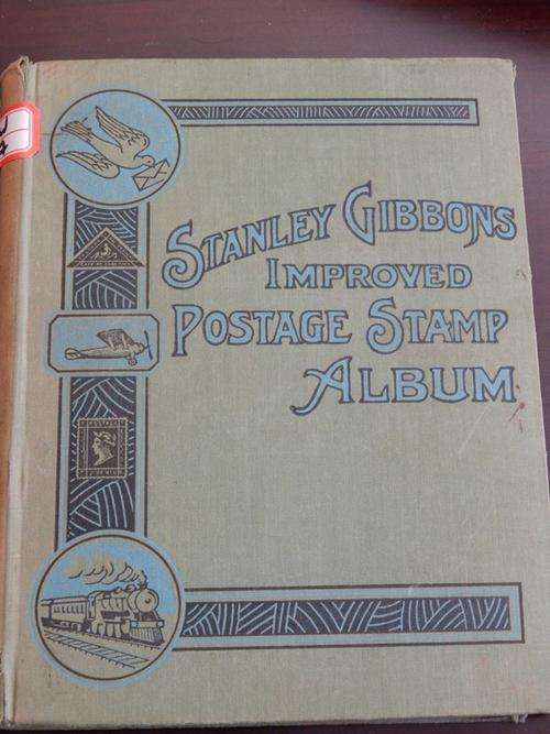 Stanley Gibbons Improved Postage Stamps Album with stamps 1931! Take a look