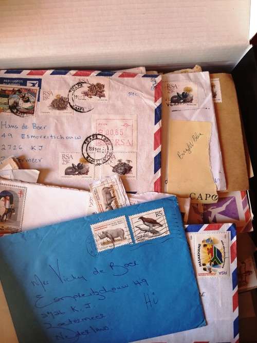 A box of RSA 5th Definative series stamps and covers on paper