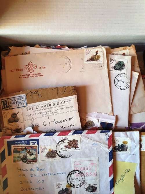 A box of RSA 5th Definative series stamps and covers on paper