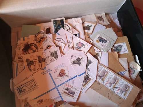 A box of RSA 5th Definative series stamps and covers on paper