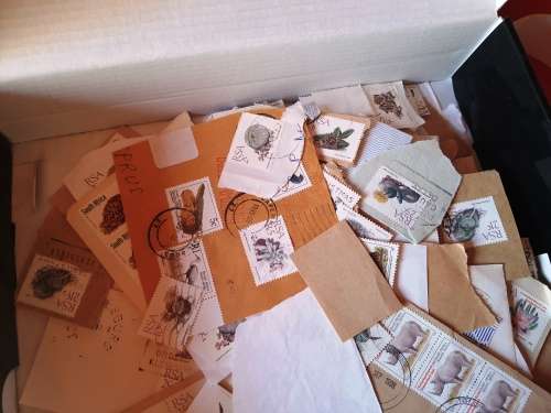 A box of RSA 5th Definative series stamps and covers on paper