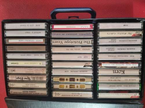 Cassette Tapes in a Vintage bag