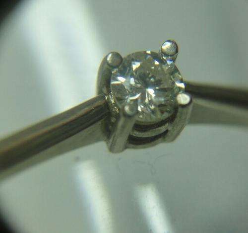 9CT WHITE GOLD AND DIAMOND SOLITAIRE