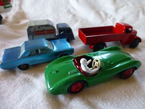 Dinky Toy Farm wagon,Dinky Aston Martin and Matchbox Pontiac GP Sports Coupe and other.