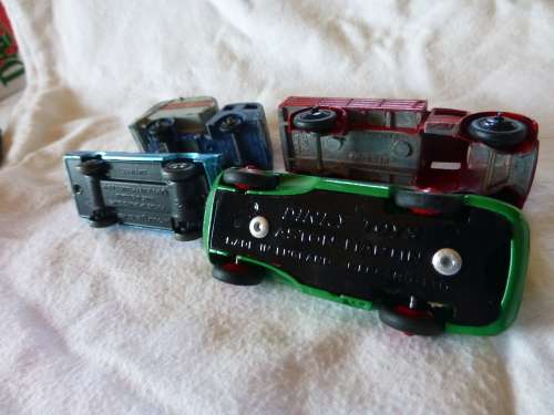 Dinky Toy Farm wagon,Dinky Aston Martin and Matchbox Pontiac GP Sports Coupe and other.