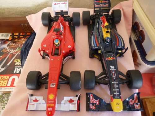 Ferrari 150 and Renault Red Bull R87 F1 Plastic cars