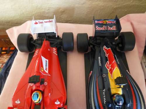 Ferrari 150 and Renault Red Bull R87 F1 Plastic cars