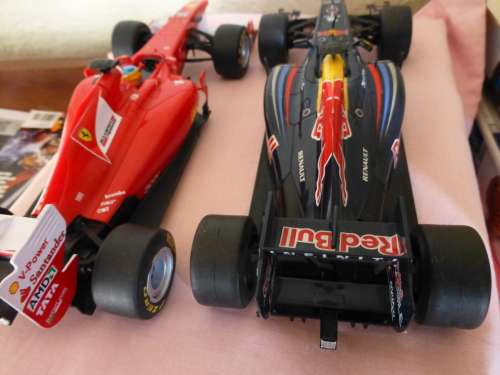 Ferrari 150 and Renault Red Bull R87 F1 Plastic cars