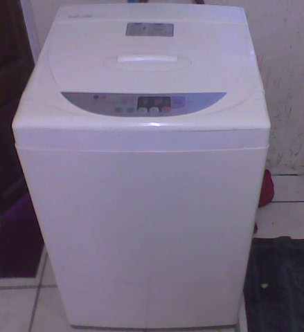LG Fuzzy Logic - top loader 8kg - ( model WF-T7014PP ) washing machine.