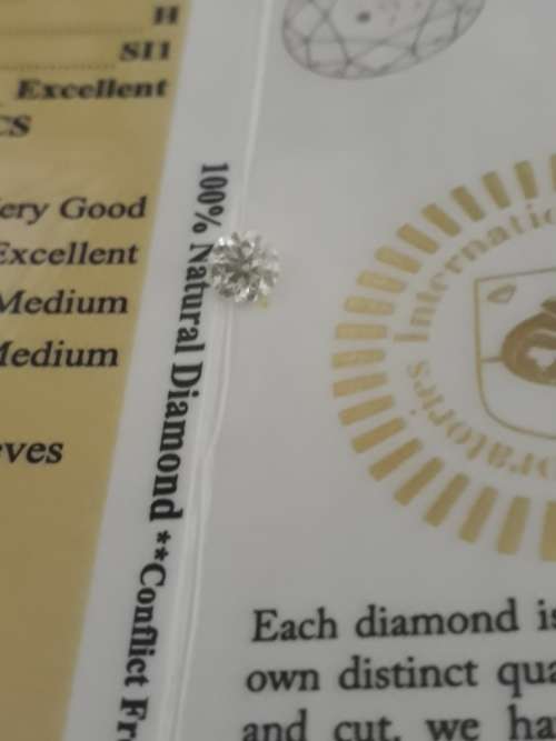 0.65ct  Round cut Diamond H colour Si1