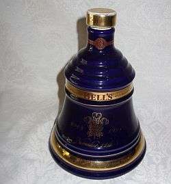 A Bells porcelain decanter by Wade of England