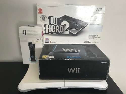 Wii console Fit and DJ Hero2 Decks with extras