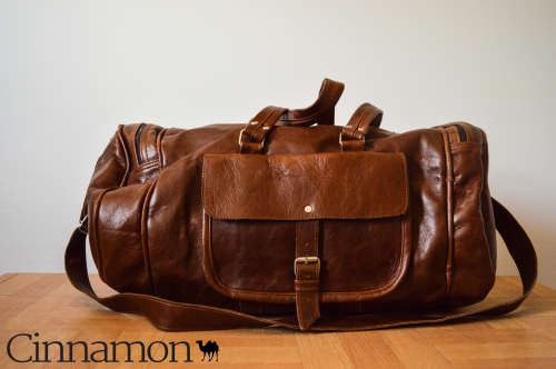 Stunning Oval Shaped Duffle Bag - Perfect For Your Travelling Needs At An Excellent Price!