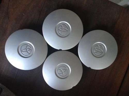 4 Tazz (2001) hub caps (silver)