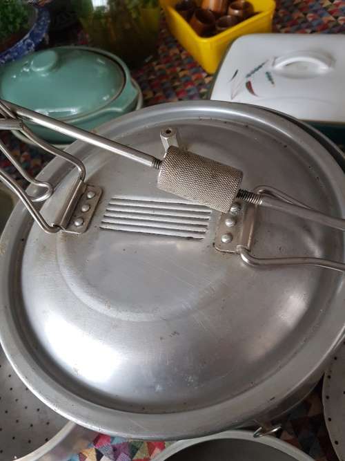 Vintage pressure cooker. Complete wirh attachments