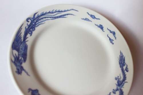 Vintage blue and white Oriental Chinese porcelain dish w dragon and phoenix flaming pearl 1960s