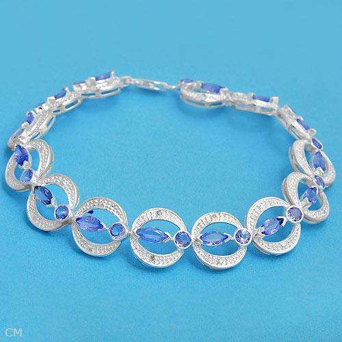 **R6 000.00**Bracelet With 4.95ctw Diamonds & Tanzanites Beautifully Designed in 925 Sterling silver