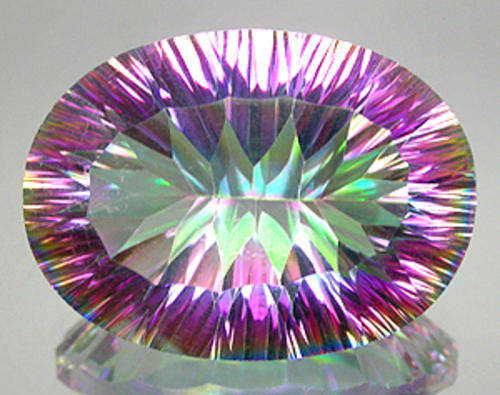 **R5 000.00**PROMINENT! 21.33ct.Rich Concave Rainbow Mystic Topaz
