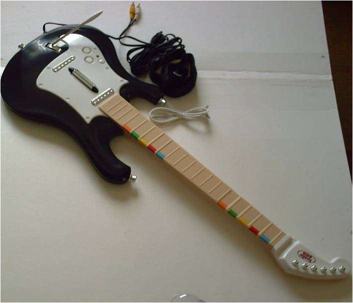 GUITAR MAN TV GAME CONSOLE (WORKS LIKE GUITAR HERO)