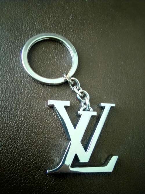 Original Louis Vuitton Key Ring. Comes withe box and unique code