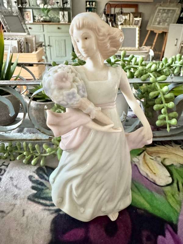Porcelain lady figurine