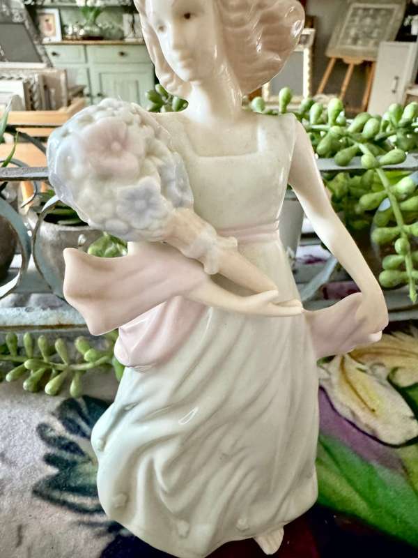 Porcelain lady figurine