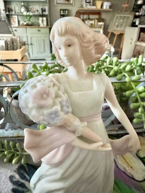 Porcelain lady figurine