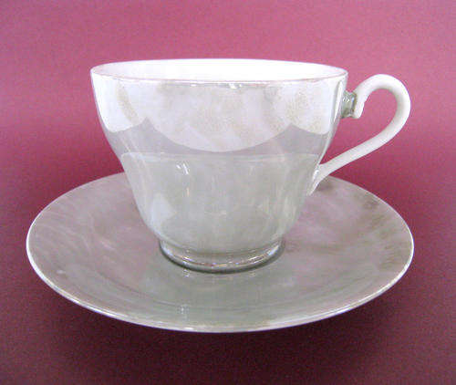 A VINTAGE SET of TWO 1950's STYLE TEA CUPS & SAUCERS - Lot 2