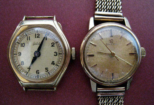 AN OMEGA 9 CT GOLD LADIES WATCH & GILDE 14 CT WATCH FACE