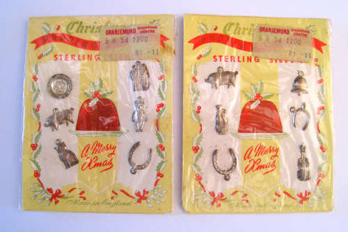 Wow! What an unusual find! Two sets of sterling silver Christmas pudding charms!!