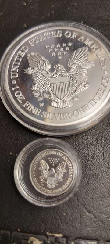 2000 American 1 OZ silver token cladded plus 1 gram pure silver tickey
