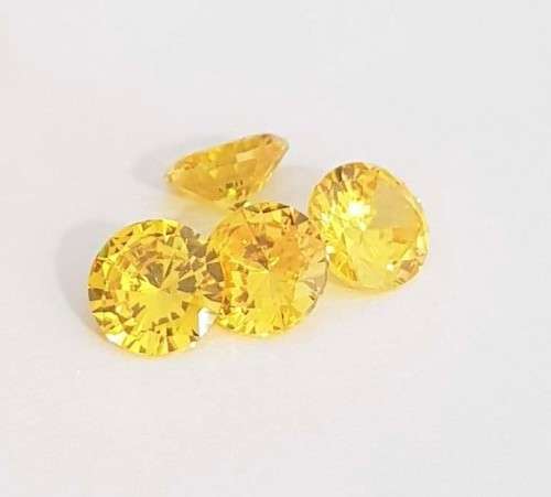 Cubic Zirconia 7.0mm Yellow Round Cut** Master Cut**