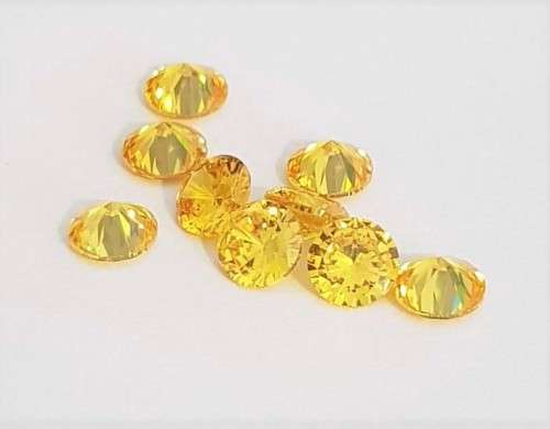Cubic Zirconia 7.0mm Yellow Round Cut** Master Cut**