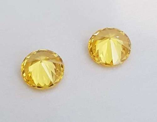 Cubic Zirconia 7.0mm Yellow Round Cut** Master Cut**