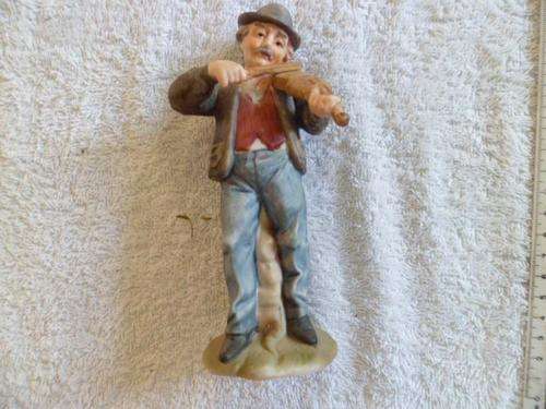 Man Playing A Fiddle Figurine