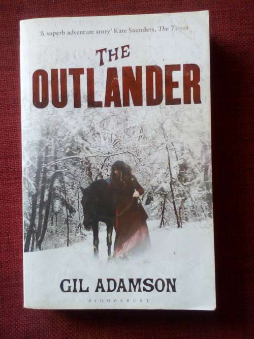 The Outlander by Gil Adamson. 1st paperback ed 2009. S/C. 389 pp.